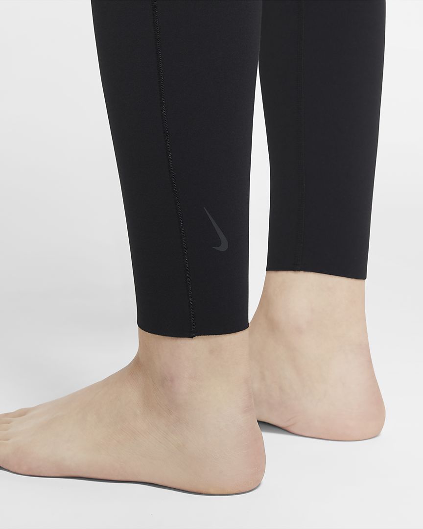 Nike Yogo jumpsuit for women, black, high-quality fabric, perfect for workouts